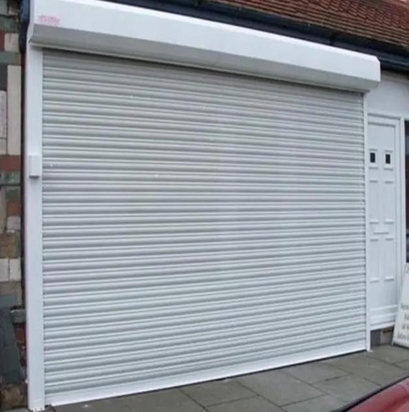 天津恒信電動(dòng)門有限公司：卷簾門、電動(dòng)卷簾門及電動(dòng)車庫(kù)門專業(yè)制造商